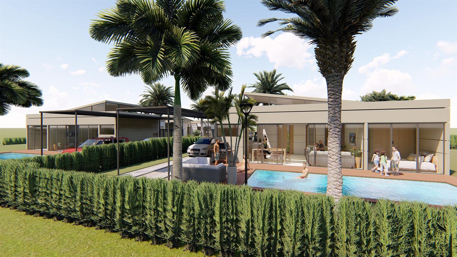 Vivienda vista desde el jardín, con palmeras y setos