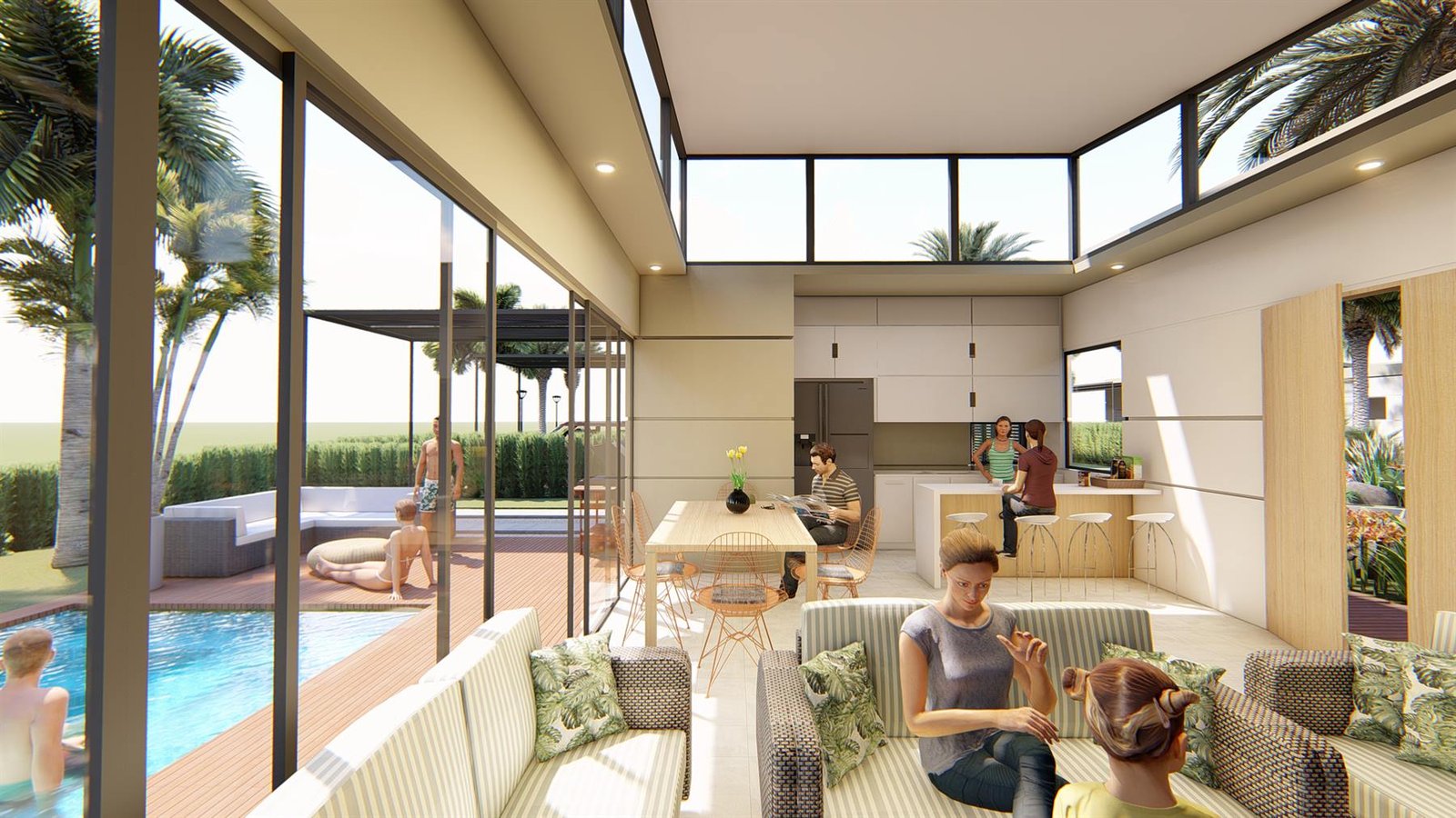Zona social interior de una vivienda, abierta a la terraza y la piscina